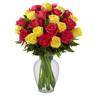 send two dozen mixed color roses in vase to japan